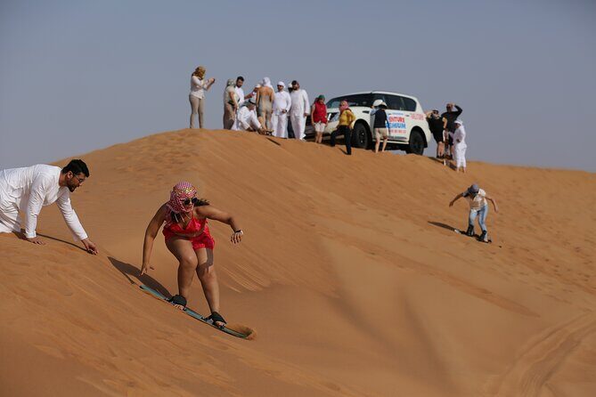 Dubai Desert Safari with Quad Bike, Dune Bashing, Camel Ride, Sand Boarding &BBQ - Authentic Experiences and Tips