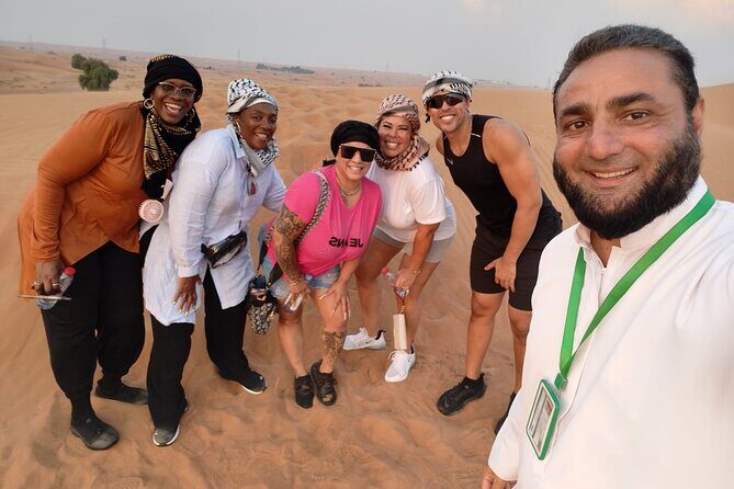 Dubai Desert Safari With Quad Bike Ride and VIP BBQ Dinner - The Adventure Begins: Pickup and Journey into the Desert