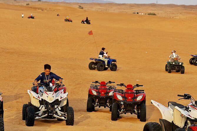 Dubai Desert Safari With Quad Bike Ride and VIP BBQ Dinner - Dune Bashing: The Heart of the Desert Safari