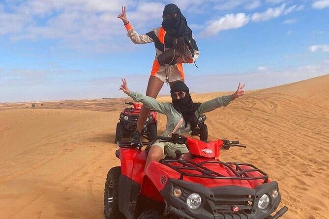 Dubai Dinner Desert Experience with 01 Hour quad bike and camel ride - An Authentic Desert Adventure with a Modern Twist