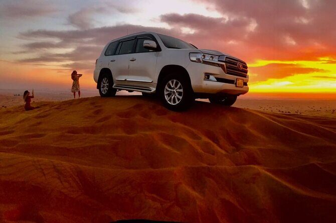 Dubai Dune Bashing with Camel Ride, Sandboarding & BBQ Dinner - What You Can Expect from the Dubai Desert Adventure