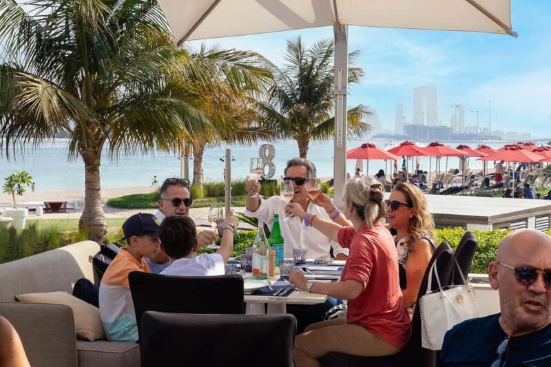 Dubai Palm Lunch & Beach Day with Views - Key Points