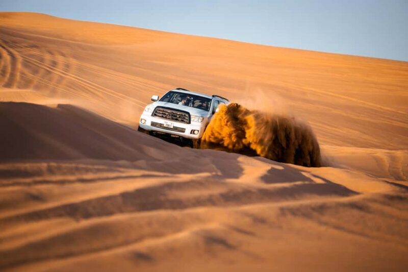 Dubai: Premium Red Dune Safari with Sandboarding & BBQ - Dining and Evening Entertainment