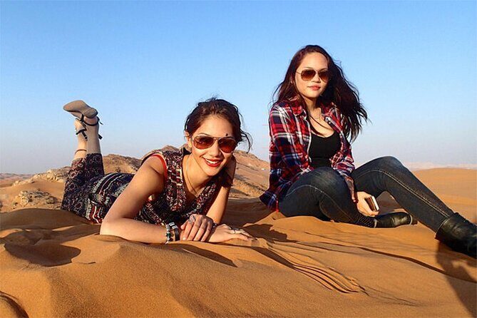 Dubai Red Dune Safari with BBQ Dinner and Live Shows - Transportation, Timing, and Group Size
