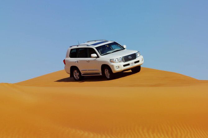 Dubai Red Dune Safari with BBQ Dinner & Live Shows from RAK - The Sum Up