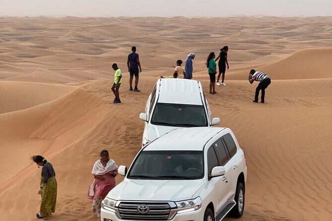 Dubai Red Dunes Afternoon Desert Safari with Camel Ride - Transportation and Group Size