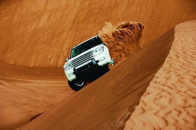 Evening Desert Safari with Belly Dance and BBQ Dinner and Camel Ride - Introduction: A Desert Safari with Flair