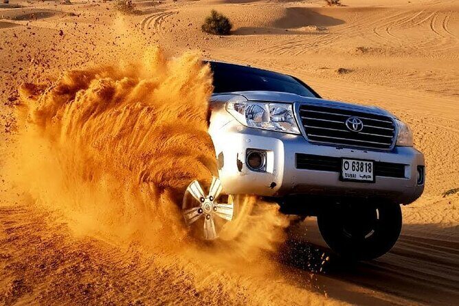 Evening Red Dunes Desert Safari: BBQ Dinner & Adventure Awaits! - An Introduction to the Tour Experience