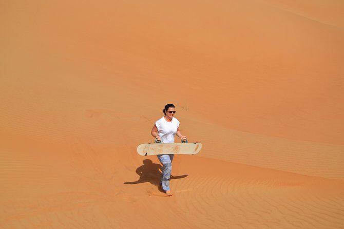 Exclusive Sunrise Desert Safari with Camel Ride Sand Boarding Dune Bashing - The Experience: What to Expect