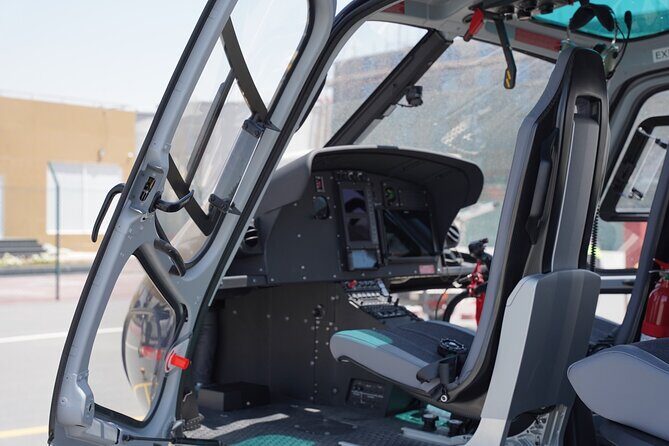 Experience thrilling Helicopter Ride in Dubai with Transfers - Experience Details and Practical Tips