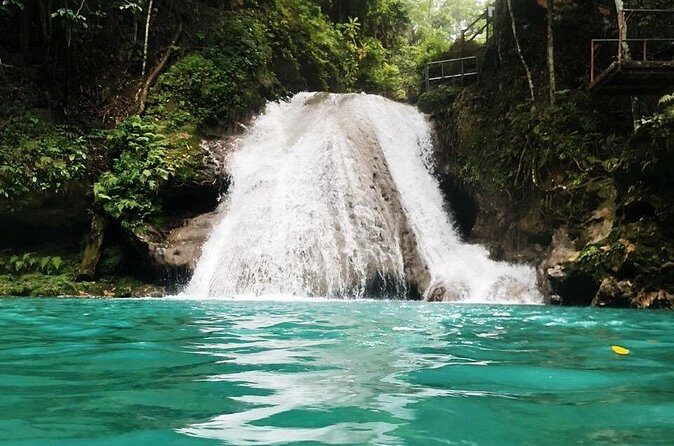 "Explore Scenic Tropical Waterfalls at Blue Hole" - The Sum Up