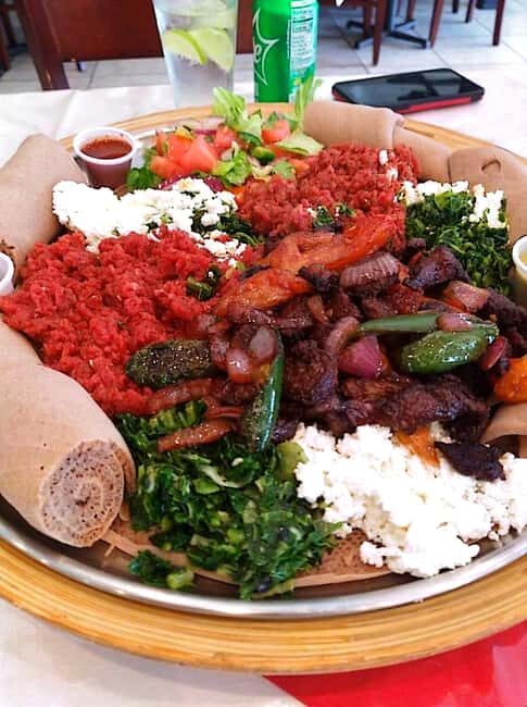 Food tour in Addis Ababa with airport pick-up. - Sampling Classic Ethiopian Dishes