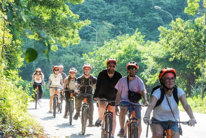 From Hanoi: Trang An, Hoa Lu & Mua Cave Full-Day Luxury Tour - Climbing Mua Cave for Panoramic Views