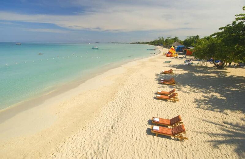 From Montego Bay: Negril Beach & Rick's Cafe Sunset Day Trip - Margaritaville: More Than Just a Beach Bar