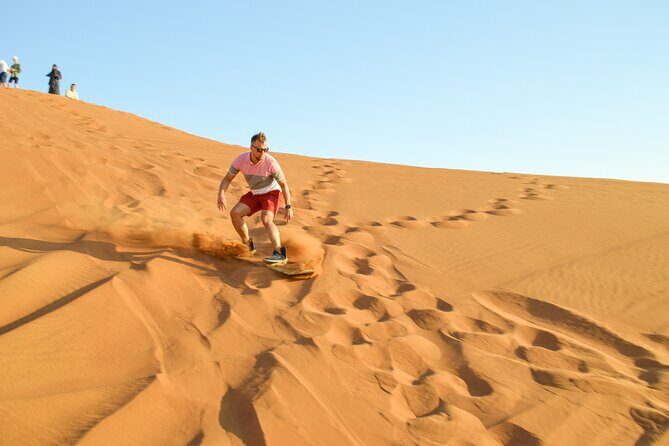 Full-Day Guided Red Dunes Desert Tour in Dubai with Camel Ride - Authentic Experiences Highlighted by Travelers