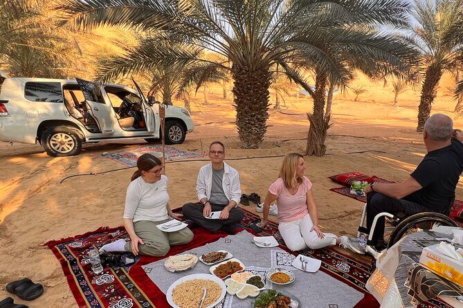 Full Day Liwa Desert Sunset Safari Tour with Lunch at Oasis - Sandboarding and Relaxation