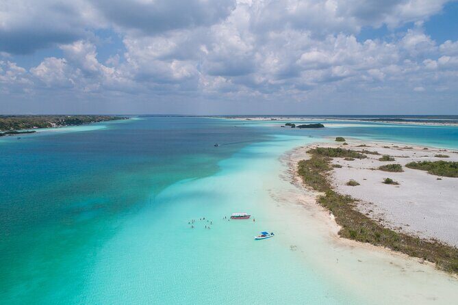 Full Day Tour to 7 Colors Bacalar Lagoon with Lunch - The Boat Cruise and Cenote Swims
