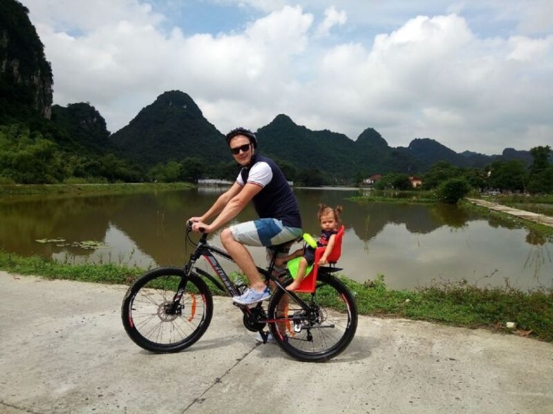 Full Day Trang An, Bich Dong Pagoda, Biking & Family Visit - The Boat Ride in Trang An: Nature’s Masterpiece