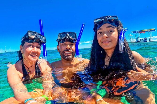 Fun Catamaran Excursion to Isla Mujeres with Unlimited drinks! - The Sum Up