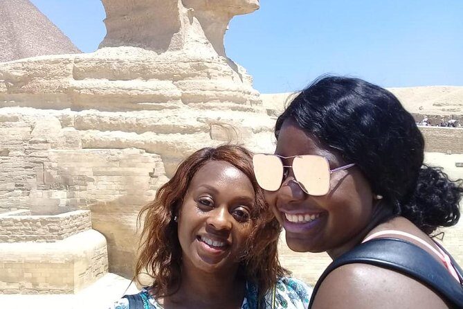 Giza Pyramids ,Egyptian Museum Camel Ride and Lunch With Private Tour - Exploring the Giza Pyramids and Sphinx