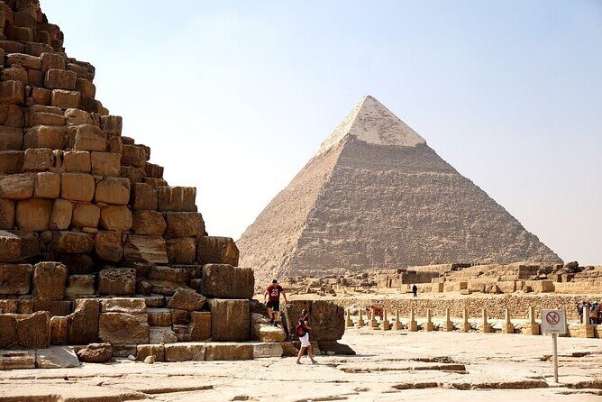 Giza Pyramids, Sphinx, Sakkara Pyramid with Camel ride & Shopping - Transportation and Guide Experience