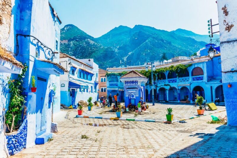 Group Day Trip From Fes to Chefchaouen with Local Guide - Key Points