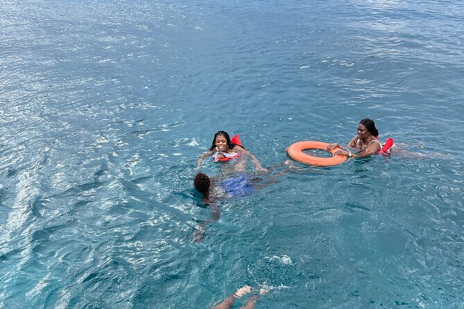Half Day Catamaran Party Boat, Snorkeling and Hip Strip Tour - Key Points