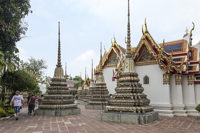 Half-Day Royal Grand Palace and Bangkok Temples Tour - Authentic Experiences and Traveler Feedback
