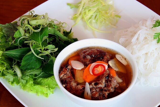 Hanoi Street Food by Walking Small Group Tour - The Guide: Your Key to the Experience