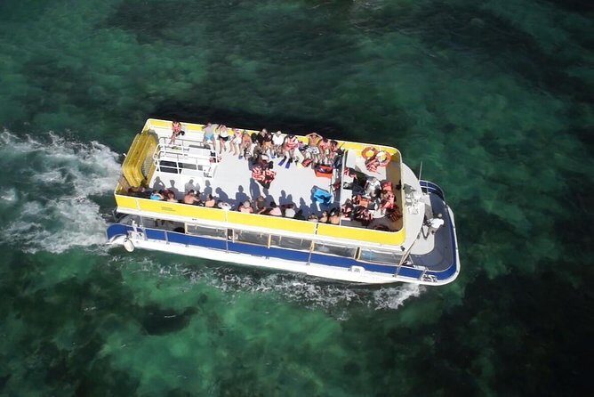 Isla Mujeres Catamaran Open Bar & Transportation from Cancun - Key Points
