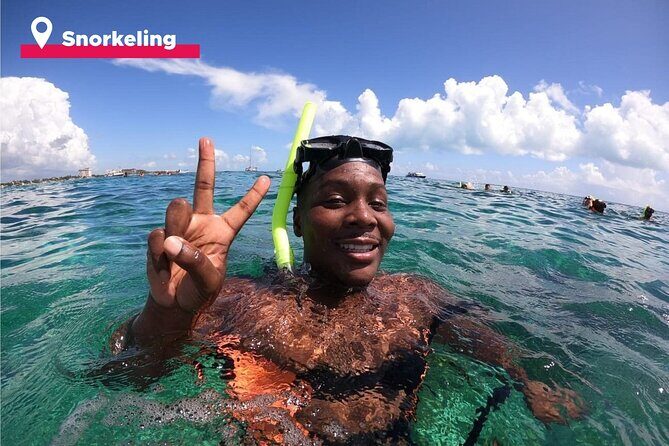 Isla Mujeres Catamaran + Snorkel + Open Bar on board + Buffet - The Sum Up
