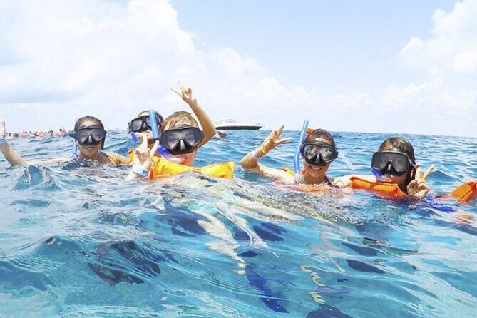 Isla Mujeres Catamaran Tour with Snorkel, Open bar and Transport - What Makes This Tour Stand Out