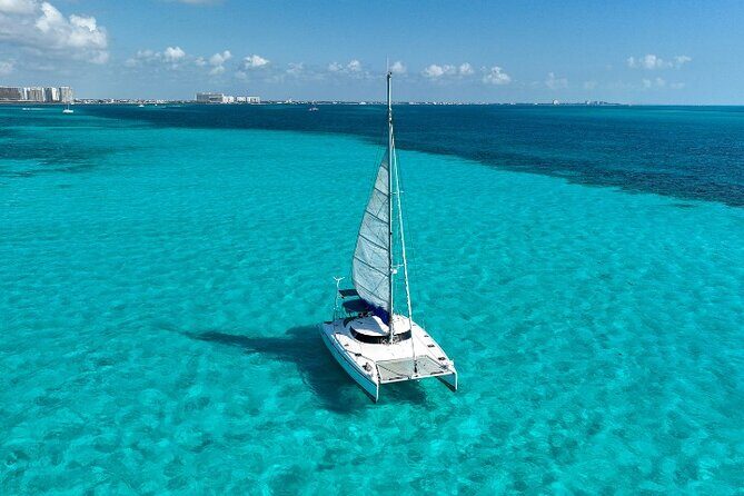 Isla Mujeres Catamaran Tour with Snorkeling, Open Bar & Buffet - Authentic Experiences and Reviewer Insights