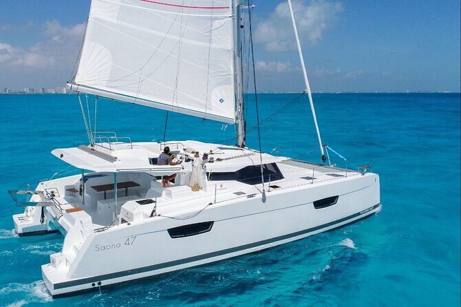 Isla Mujeres Cruise with Beach Club, Snorkel, Lunch and Open Bar - In Summary