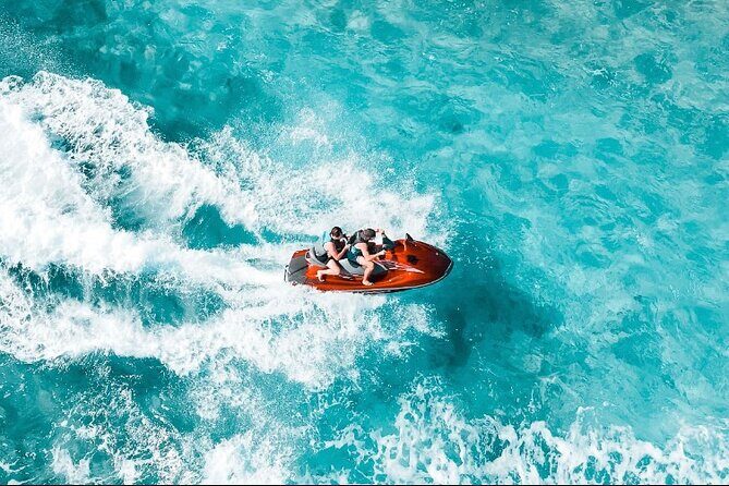 Jet Skiing around La famille ship and smaller pristine cays - The Experience and Value