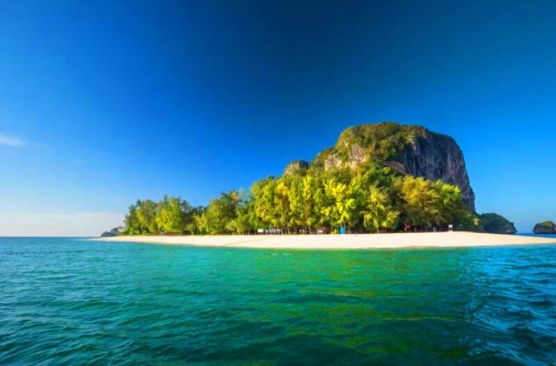 Krabi: 4 Islands Sunset Longtail Boat Tour with BBQ Dinner - The First Stop: Railay Island – Snorkeling Heaven