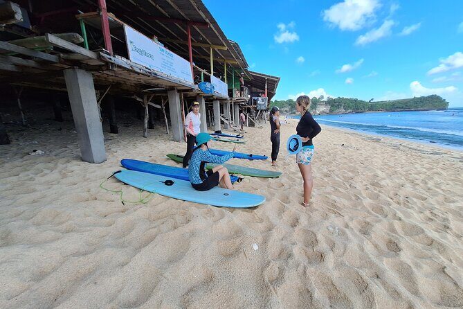 Kuta Surfing Lessons with Custom Surfboards and Surfboard Rentals - Key Points