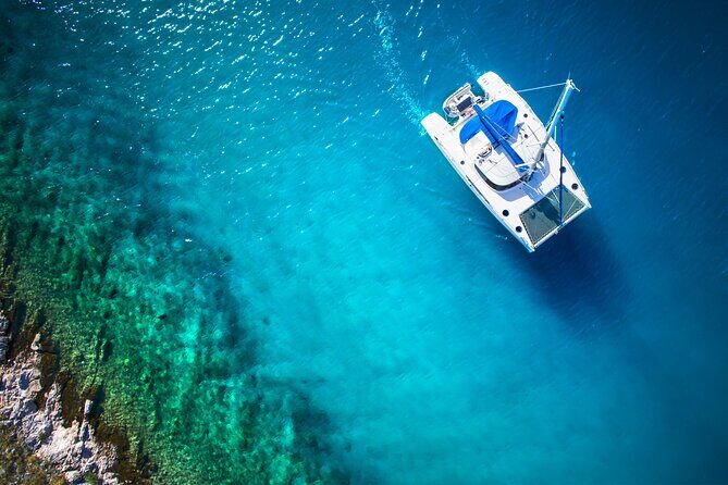 Live this unique experience. Catamaran to Isla Mujeres Tour. Open Bar included. - Discover the Catamaran to Isla Mujeres Tour: A Practical Look for Travelers