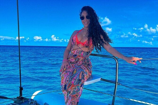 Luxury Catamaran to Isla Mujeres, Snorkeling, Buffet and Ice Bar - The Sum Up