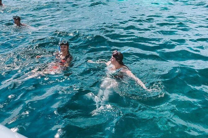 Luxury Catamaran to Isla Mujeres, Snorkeling, Buffet and Ice Bar - Frequently Asked Questions