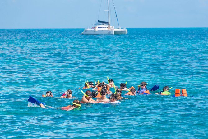 Luxury Catamaran tour to Isla Mujeres with transportation from Playa del Carmen - What Travelers Should Know
