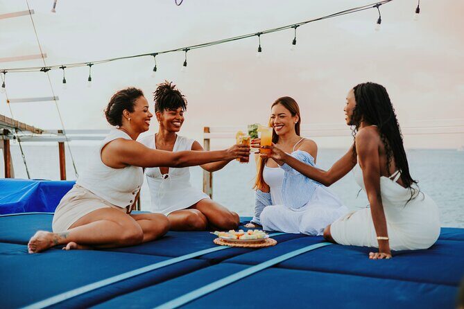 Luxury Four-Course Caribbean Dinner Cruise Experience - Music and Atmosphere