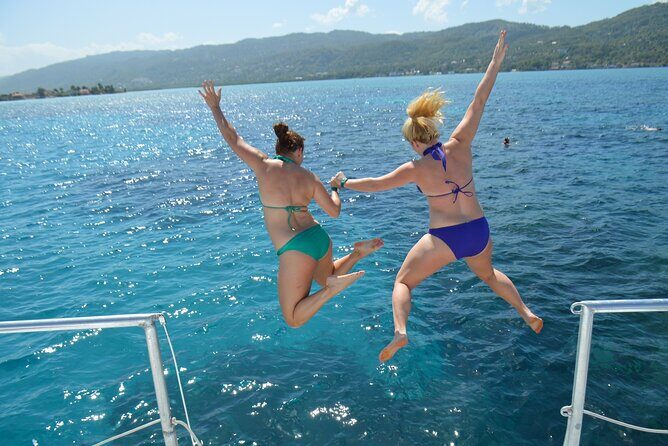 Montego Bay Catamaran: Snorkel Tour with Open Bar & Reggae DJ - Key Points