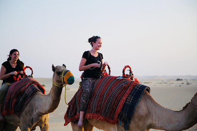 Morning Desert Safari with Camel Ride & Sand Skiing Private Tours - Transportation and Group Size