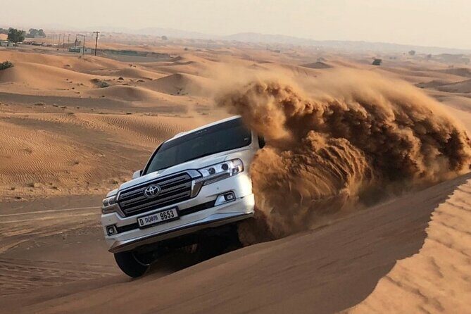 Morning Dune Bashing with Camel Trekking and sand boarding - Key Points