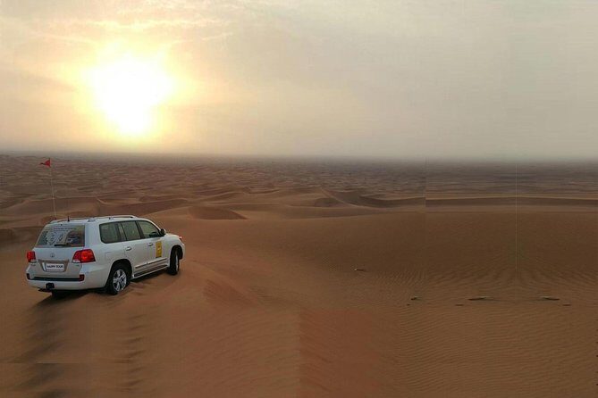 Morning Dune Bashing With Sand Boarding And Camel Ride in Red Dunes Desert - Red Dunes Desert Morning Adventure: A Balanced Look at a Thrilling Experience