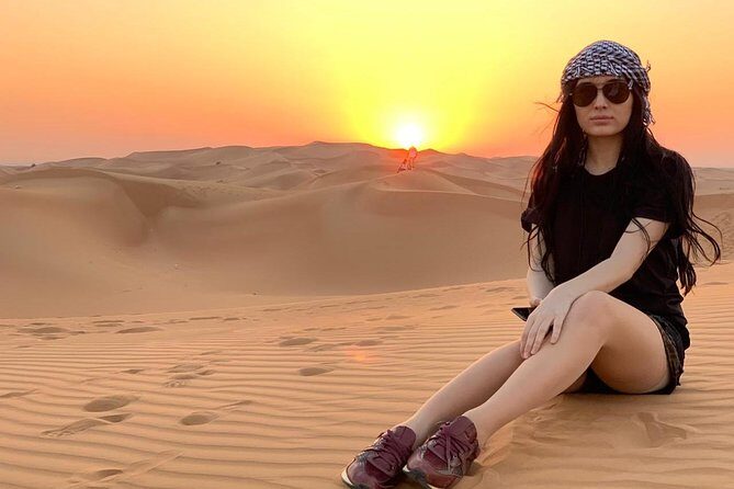 Morning Dune Bashing With Sand Boarding And Camel Ride in Red Dunes Desert - Authenticity and Guide Experience