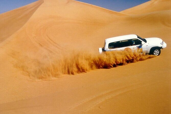Morning Thrilling Dune bashing , Send Boarding & Camel ride - Key Points