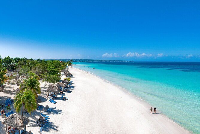 Negrils Seven Miles Beach, Rick's cafe and Parasailing Tour. - The Charm of Lucea: A Brief Cultural Stop