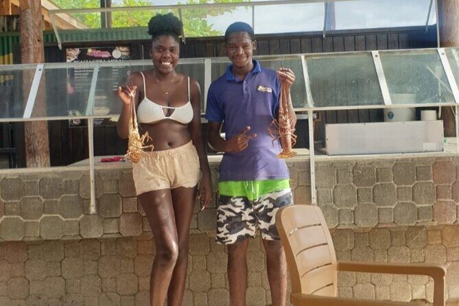 Negrils Seven Miles Beach, Rick's cafe and Parasailing Tour. - Parasailing: Soaring Above Negril